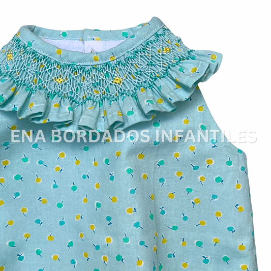 Mameluco aqua con manzanitas con panal en el cuello