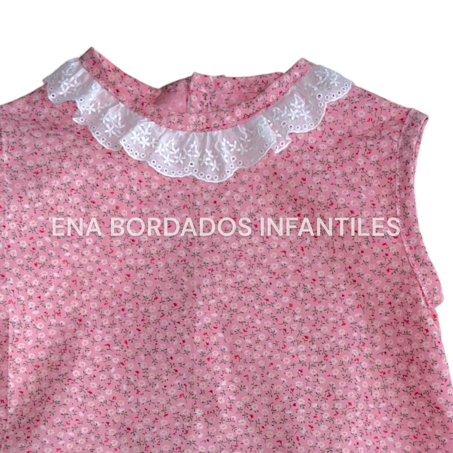 Blusa rosada flores con calzón y tira bordada
