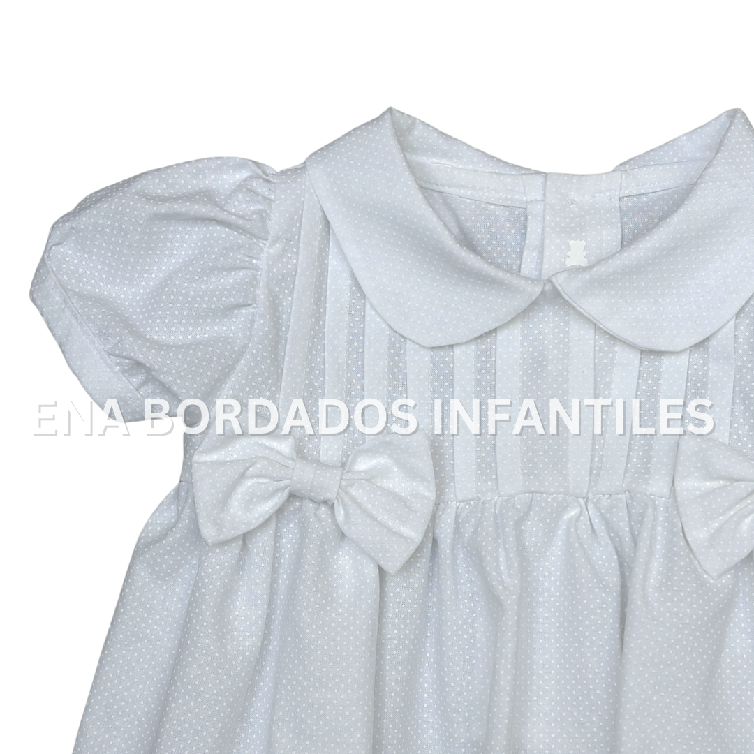Vestido blanco puntitos blancos con guarda de tira bordada