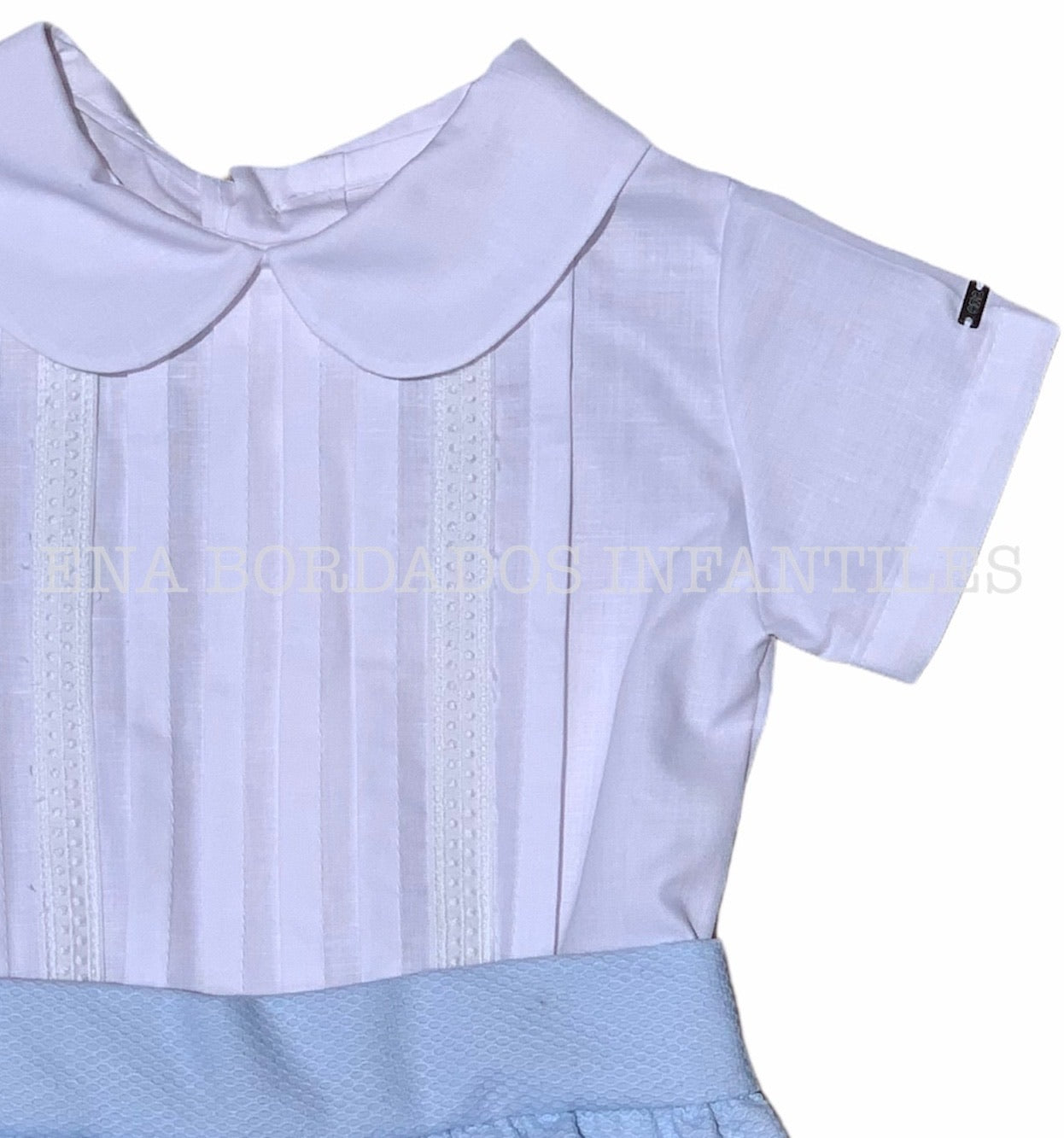 Camisa alforzas y tira bordada con short piqué español celeste 6 meses