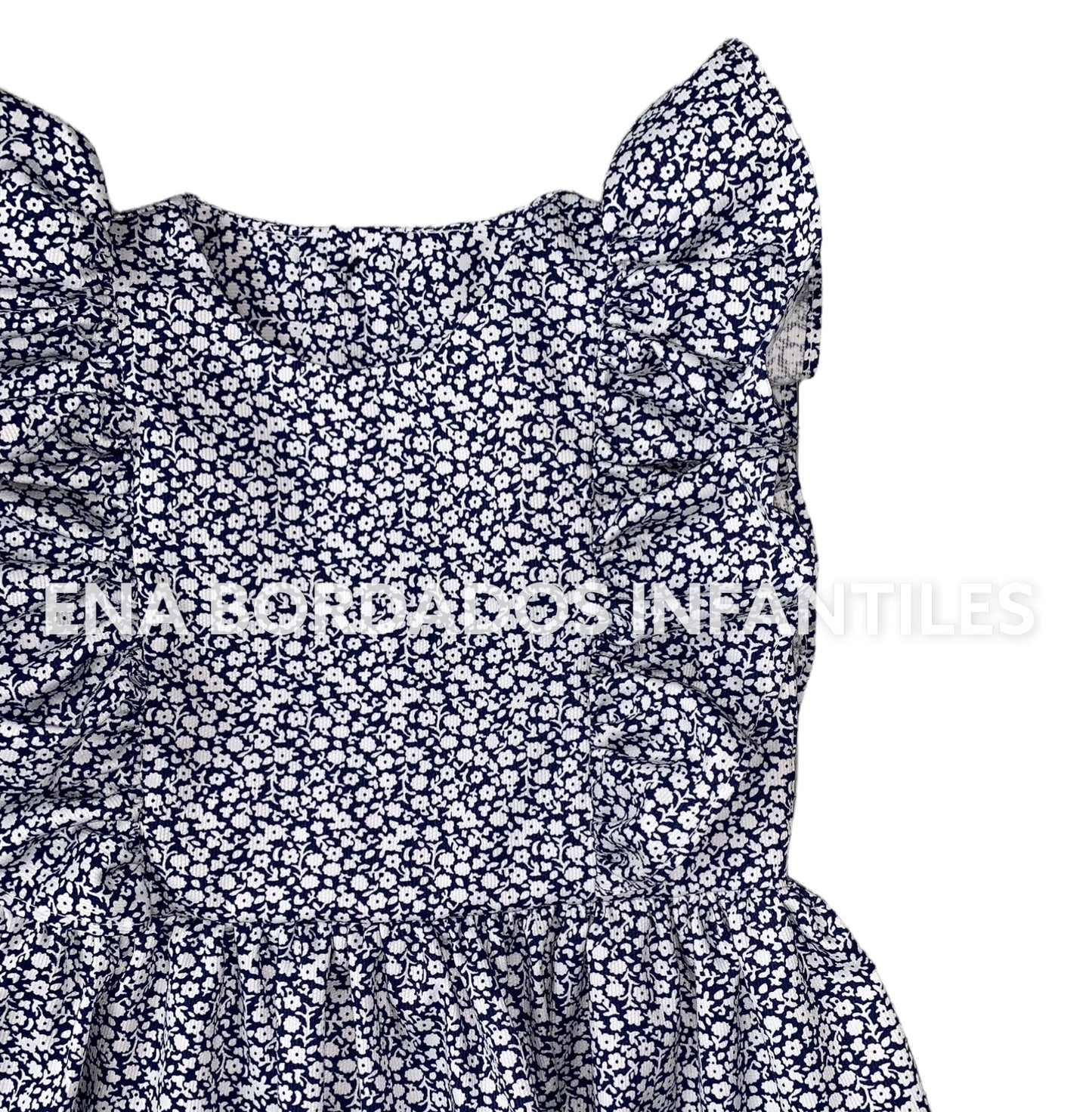 Vestido azul marino con flores blancas escarola