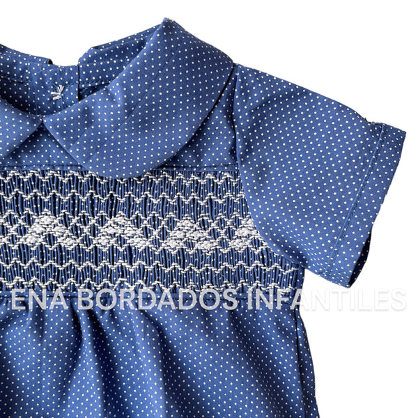 Mameluco azul puntitos blancos con panal