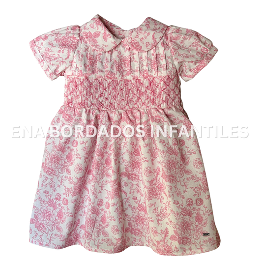 Vestido blanco con flores rosadas alforzas con panal