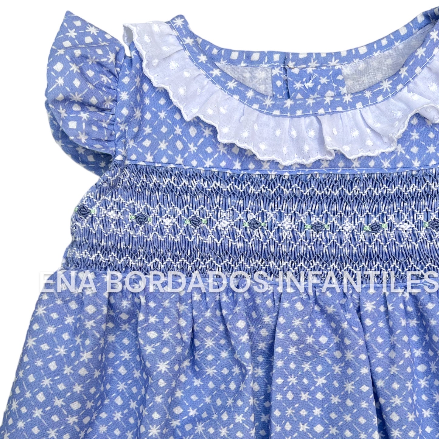 Vestido azul celeste panal con tira bordada