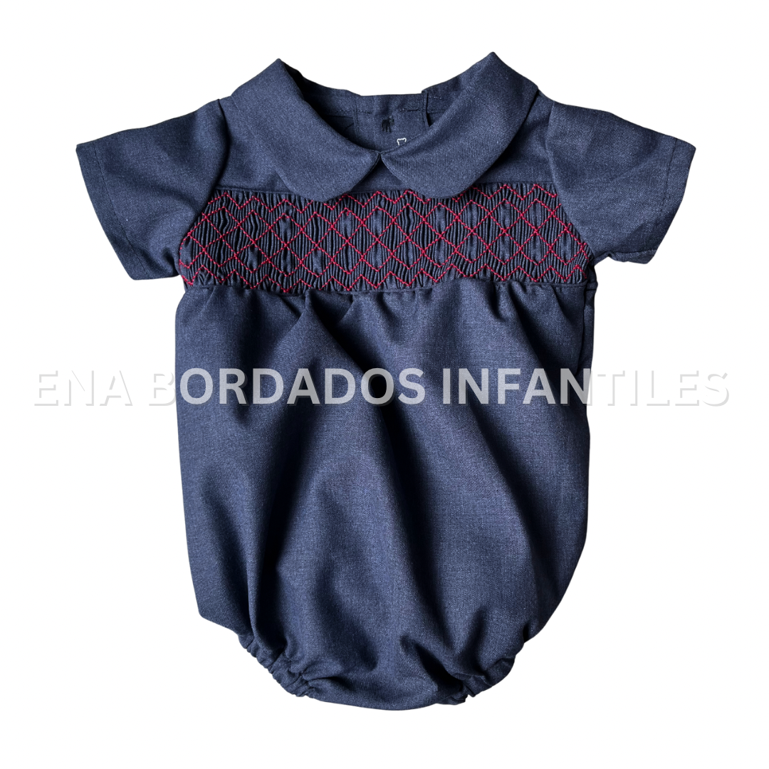 Mameluco azul con panal rojo