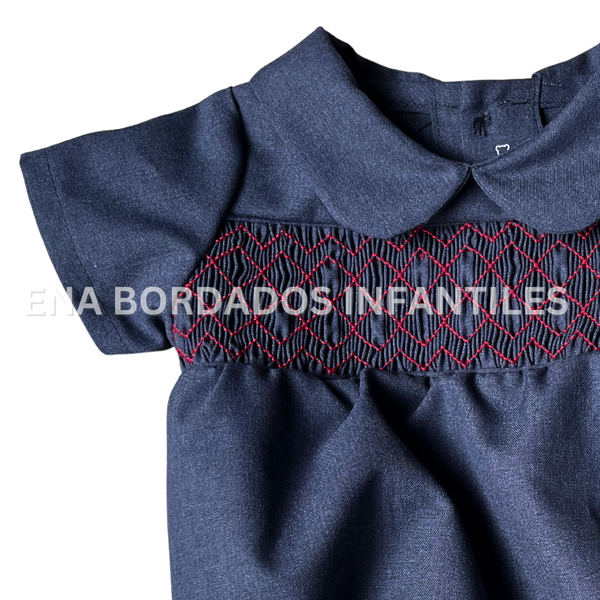 Mameluco azul con panal rojo