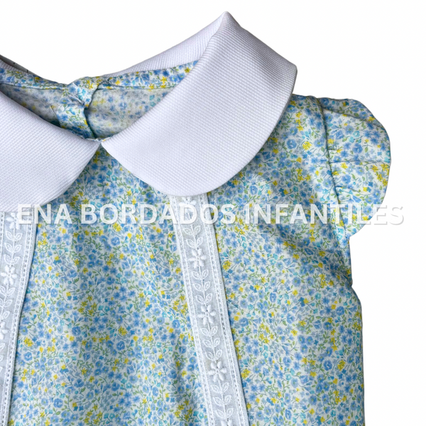 Mameluco tira bordada flores celestes y amarillas