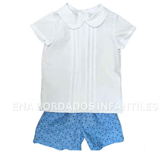 Camisa blanca con alforzas y short celeste estampado 4 años