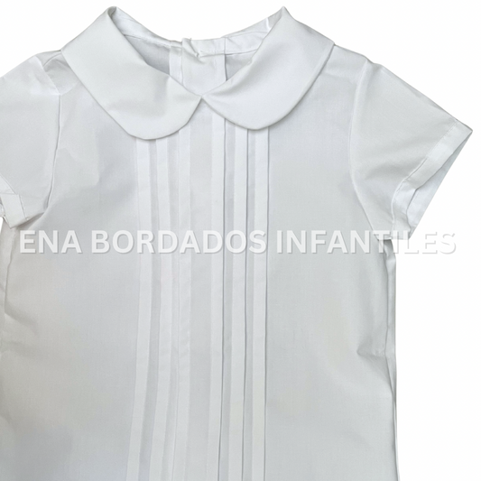 Camisa blanca con alforzas y short celeste estampado 4 años