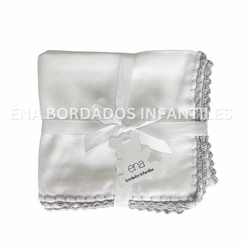 Mantita ojo de perdiz orilla crochet gris