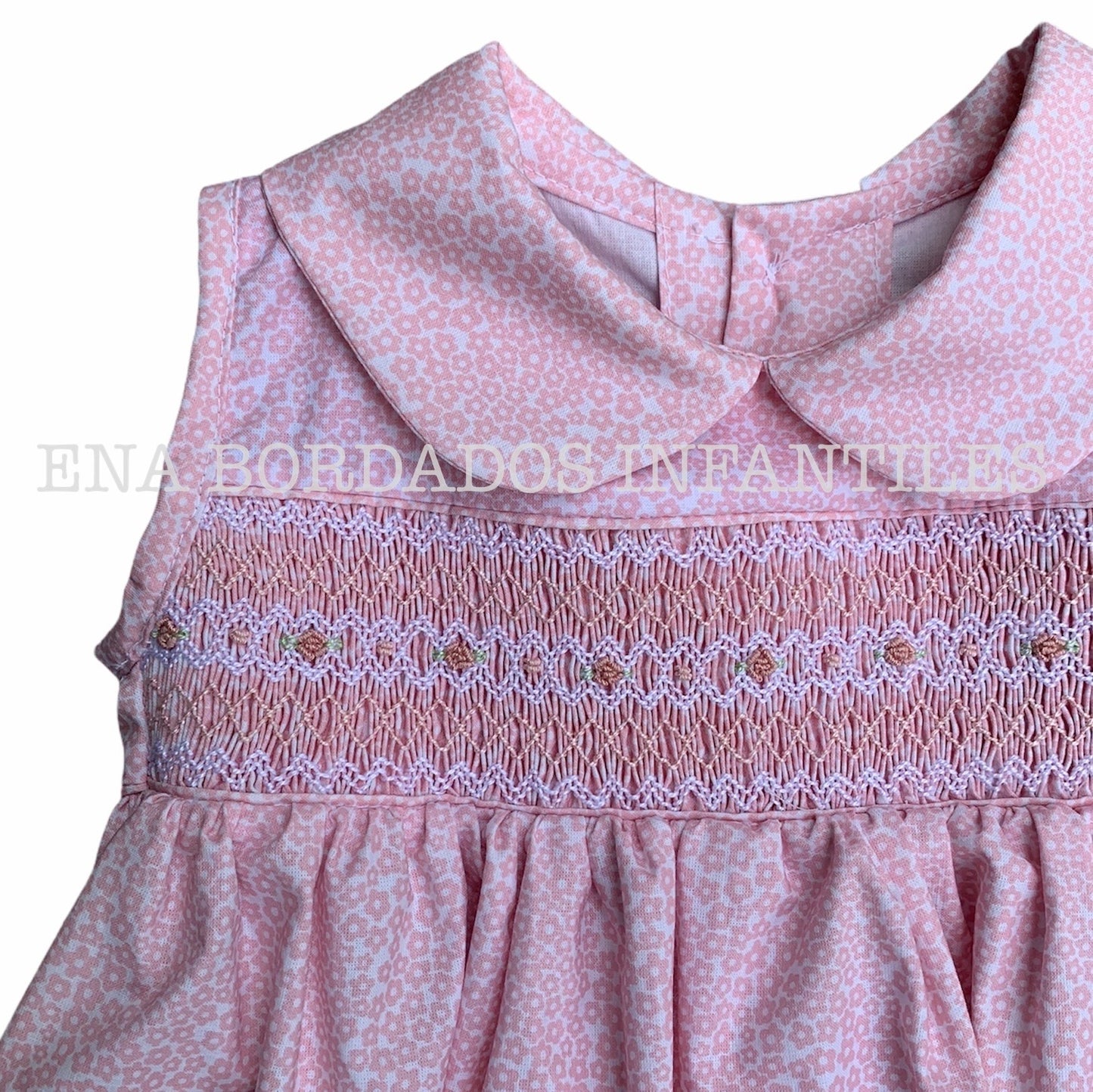 Vestido flores rosadas panal sin mangas