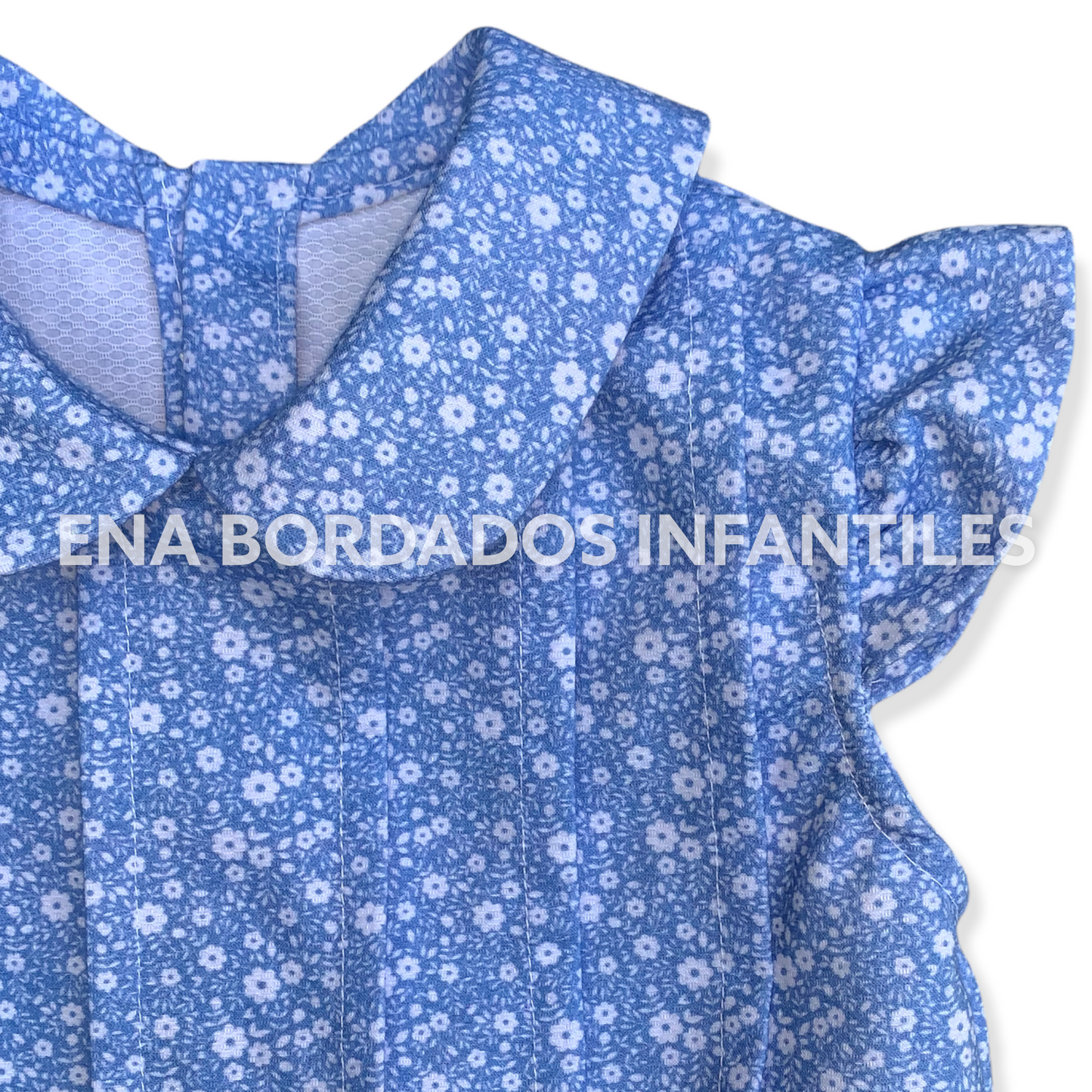 Vestido talle bajo, piqué español celeste flores blancas